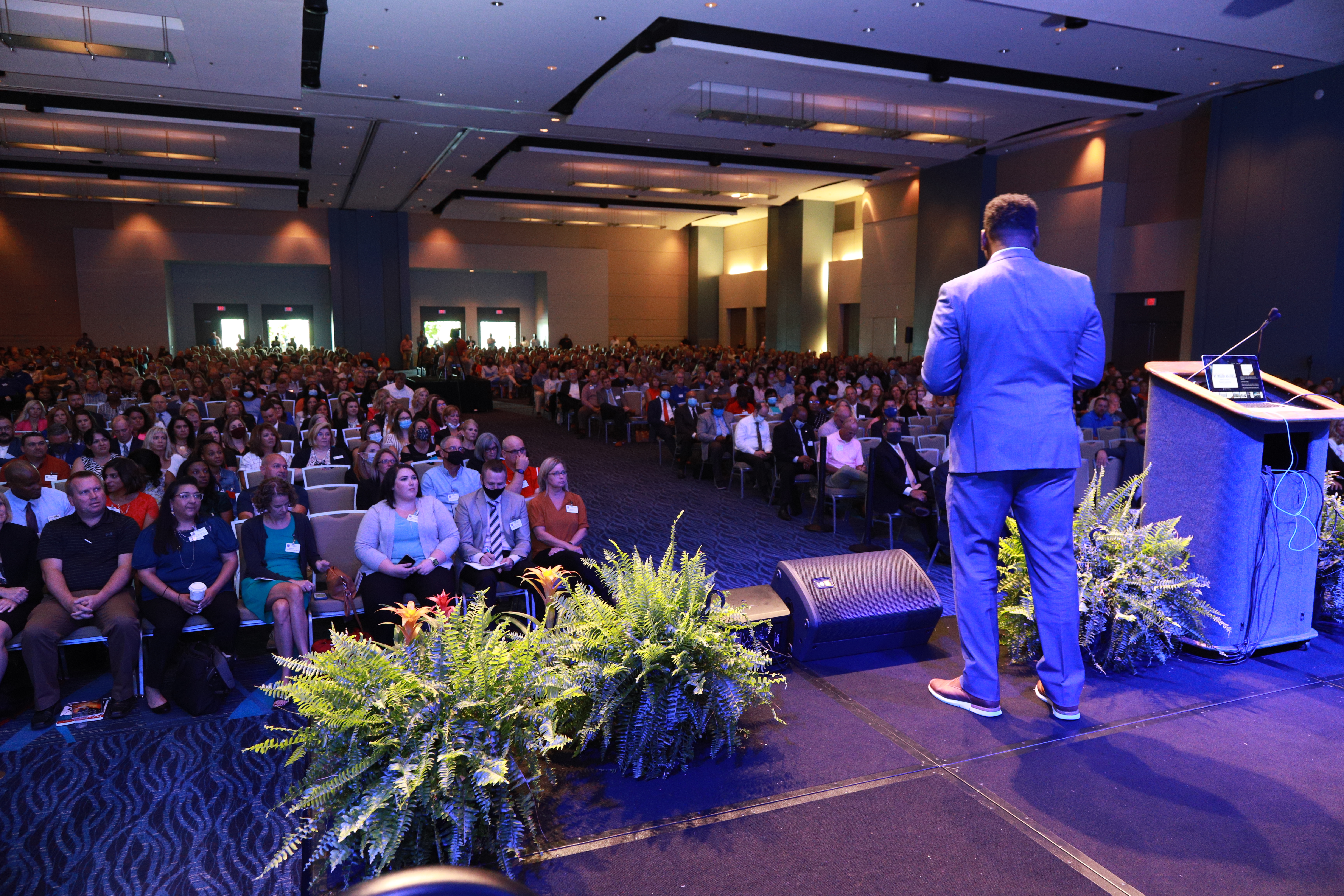 Freddie Scott speaking to a packed audience