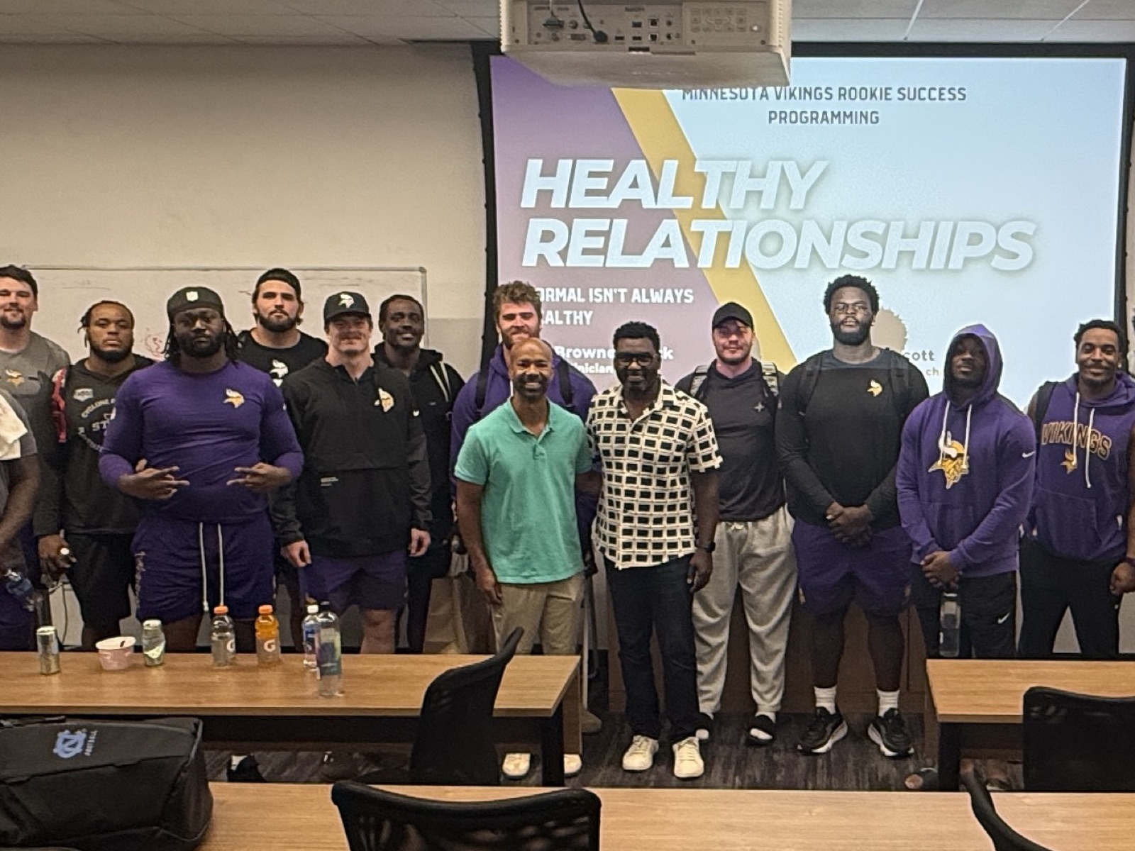 Freddie Scott II with an NFL rookie class after a Healthy Relationships session